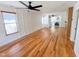 Bright living room featuring sleek wood floors, a modern fireplace, unique wall accents, and an open layout at 1100 Chester St, Durham, NC 27701