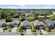 Beautiful aerial view of homes in a well-maintained neighborhood with lush landscaping and mature trees at 115 Moss Creek Pl, Fuquay Varina, NC 27526