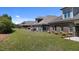 Spacious backyard featuring a well-manicured lawn and well-maintained homes at 115 Moss Creek Pl, Fuquay Varina, NC 27526