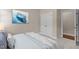 Charming bedroom with blue tones, nautical art, and double door closet at 115 Moss Creek Pl, Fuquay Varina, NC 27526