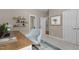Office space featuring a stylish desk, chair, and floating shelves for decor at 115 Moss Creek Pl, Fuquay Varina, NC 27526