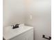 Modern bathroom featuring a sleek white vanity and matte black fixtures at 11700 Coppergate Dr # 100, Raleigh, NC 27614