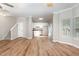 Inviting open-concept space features hardwood floors, stairs, and a modern kitchen at 11700 Coppergate Dr # 100, Raleigh, NC 27614