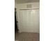 Bedroom closet with white folding doors and neutral carpet at 1304 Cozart St # 109, Durham, NC 27704