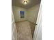 This bedroom has neutral walls and carpet and a window with blinds at 1304 Cozart St # 109, Durham, NC 27704