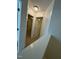 Hallway with plush carpet providing access to other rooms at 1304 Cozart St # 109, Durham, NC 27704