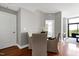A dining room with hardwood floors and seating for four at a round table at 140 W Franklin St # 706, Chapel Hill, NC 27516
