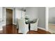Dining room with seating for four and views of the entrance hall at 140 W Franklin St # 706, Chapel Hill, NC 27516