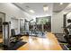 Bright gym featuring various machines and ample workout space at 140 W Franklin St # 706, Chapel Hill, NC 27516