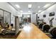 Bright, spacious gym featuring various machines and workout areas at 140 W Franklin St # 706, Chapel Hill, NC 27516
