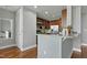 Kitchen with wooden cabinets, granite countertops, stainless steel appliances, and a breakfast bar at 140 W Franklin St # 706, Chapel Hill, NC 27516