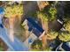 Discover this home from above, nestled among lush trees with a private driveway and a spacious yard at 15 Colonial Hills Dr, Lillington, NC 27546