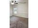 A spacious bedroom featuring carpet floors, neutral walls, and lots of natural light at 15 Colonial Hills Dr, Lillington, NC 27546