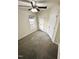 Cozy bedroom with neutral carpet, ceiling fan, and ample closet space at 15 Colonial Hills Dr, Lillington, NC 27546