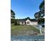 Charming home with manicured lawn, driveway, and attached garage at 15 Colonial Hills Dr, Lillington, NC 27546