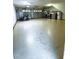 Spacious garage with ample storage and a lawnmower inside at 15 Colonial Hills Dr, Lillington, NC 27546