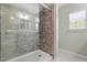 Glass-enclosed shower with subway tile and dual shower heads at 15 Epping Ct, Durham, NC 27703