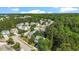 Community view of the homes surrounded by mature trees and greenery at 1608 Hayesville Dr, Fuquay Varina, NC 27526