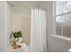 Close up of shower and window with natural light and tasteful decor at 1608 Hayesville Dr, Fuquay Varina, NC 27526