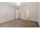 Spacious bedroom with neutral color scheme, soft carpet, and ceiling fan at 1608 Hayesville Dr, Fuquay Varina, NC 27526