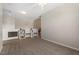 Large bonus room with plenty of space, shelves and a carpet at 1608 Hayesville Dr, Fuquay Varina, NC 27526