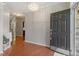 Spacious entryway with wood floors, high ceilings, and a view of the living spaces at 1608 Hayesville Dr, Fuquay Varina, NC 27526
