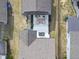 Aerial view showcases a patio featuring lounge chairs, and an outdoor dining table at 1616 Silo Ridge Dr, Wake Forest, NC 27587