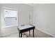 Bright bedroom with a modern desk, and ample natural light at 1616 Silo Ridge Dr, Wake Forest, NC 27587