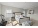 Bright bedroom features a crystal chandelier, neutral walls, and plush decor at 1616 Silo Ridge Dr, Wake Forest, NC 27587