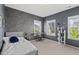 Bedroom features gray walls with keyboard and ample natural light at 1616 Silo Ridge Dr, Wake Forest, NC 27587