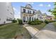 Charming two-story home with a landscaped front yard and inviting front porch at 1616 Silo Ridge Dr, Wake Forest, NC 27587