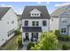 Charming two-story home features a welcoming porch and well-maintained landscaping at 1616 Silo Ridge Dr, Wake Forest, NC 27587