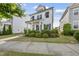 Charming white two-story home with landscaped front yard on quiet street at 1616 Silo Ridge Dr, Wake Forest, NC 27587