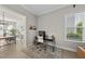 Dedicated work space offering a view of a generously sized table for entertaining at 1616 Silo Ridge Dr, Wake Forest, NC 27587