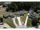 Aerial view of a neighborhood with well-maintained homes and landscaped yards at 199 Courtney Ln, Dunn, NC 28334