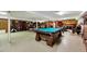 Expansive basement featuring a pool table, various furniture, and ample space for recreation at 206 Kittys Ln, Erwin, NC 28339