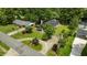 Aerial view of the property showcasing its location, lush greenery, and neighborhood at 209 E Winston St, Youngsville, NC 27596