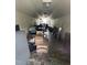 Spacious basement area with tile flooring, versatile for storage or customization at 209 E Winston St, Youngsville, NC 27596