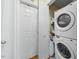 Convenient laundry area features a stacked washer and dryer unit to maximize space efficiency at 214 Northwood Cir, Durham, NC 27701