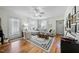 Open-concept living room features hardwood floors and a cozy atmosphere, perfect for relaxation at 214 Northwood Cir, Durham, NC 27701
