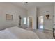 Bright bedroom with walk-in closet and doorways leading to other rooms in the home at 215 Graduate Ct, Durham, NC 27713