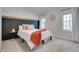 Cozy bedroom with modern decor, natural light, and a comfortable bed at 215 Graduate Ct, Durham, NC 27713
