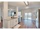Open concept kitchen with stainless appliances, granite countertops, and a seamless transition to the living area at 215 Graduate Ct, Durham, NC 27713