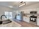 Modern kitchen featuring stainless steel appliances, granite countertops, and a sleek design at 215 Graduate Ct, Durham, NC 27713
