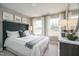 Sunlit bedroom with large windows, neutral tones, and a comfortable, inviting atmosphere at 2301 Bay Minette Sta # 538, Apex, NC 27502