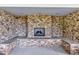 Outdoor living space featuring a brick fireplace with a stone hearth and built in seating areas at 2301 Bay Minette Sta # 538, Apex, NC 27502