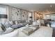 Open concept living area flowing into the kitchen and dining area, with large windows and modern decor at 2301 Bay Minette Sta # 538, Apex, NC 27502