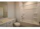 Bathroom with a tiled floor, tub, shower, toilet, and vanity with a sink at 2323 Hunter Woods Dr # 566, Apex, NC 27502