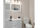 Updated bathroom boasts a modern vanity, new fixtures, and bright lighting for a fresh, clean feel at 2624 Gary Rd, Rocky Mount, NC 27803