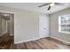 Inviting bedroom features luxury vinyl plank flooring, a window, and a closet for ample storage at 2624 Gary Rd, Rocky Mount, NC 27803